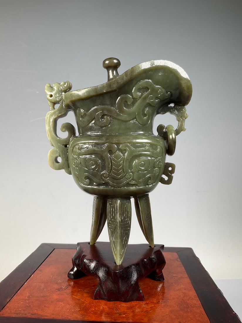 An Exquisite White Jade Beast-Face Pattern Goblet Ornament (1 of 7)