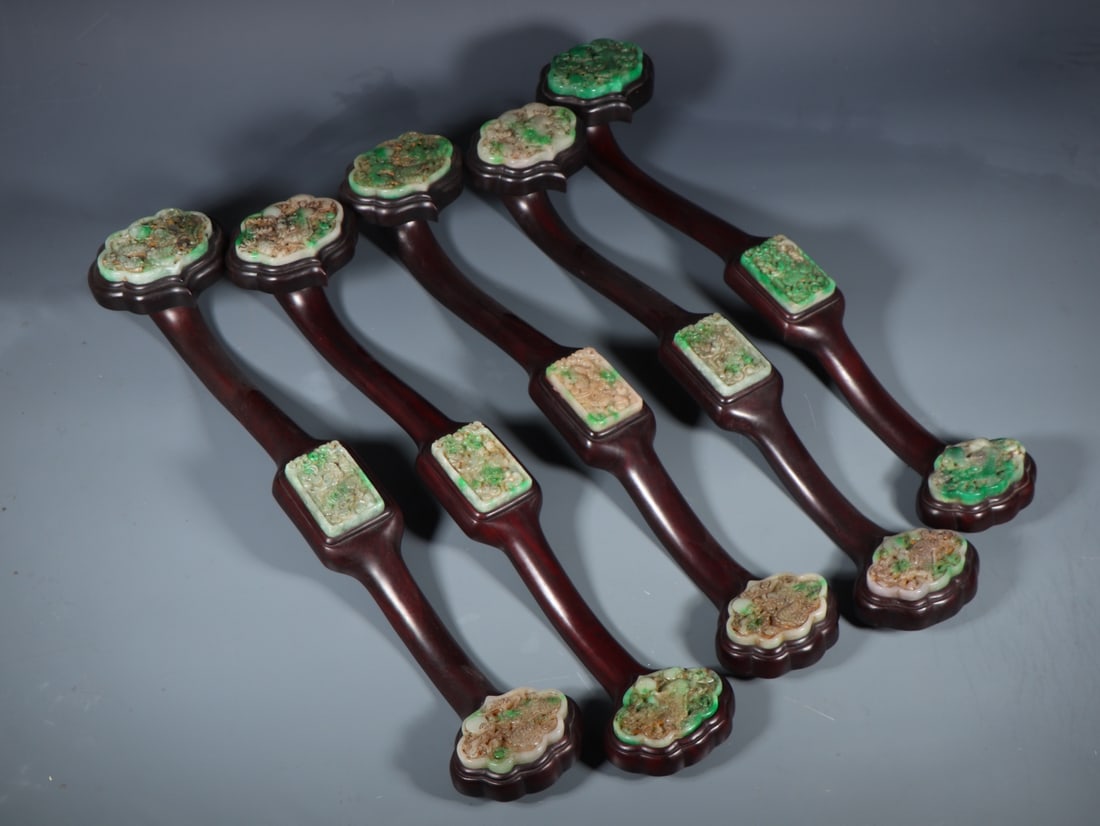 A Set of Fine Jadeite Dragon Pattern Ruyi: A Set of Fine Jadeite Dragon Pattern Ruyi Qing Dynasty, China Size:20.9inx4.4in Weight:5095g翡翠如意一套 中国清代 Size:53cmx11.1cm