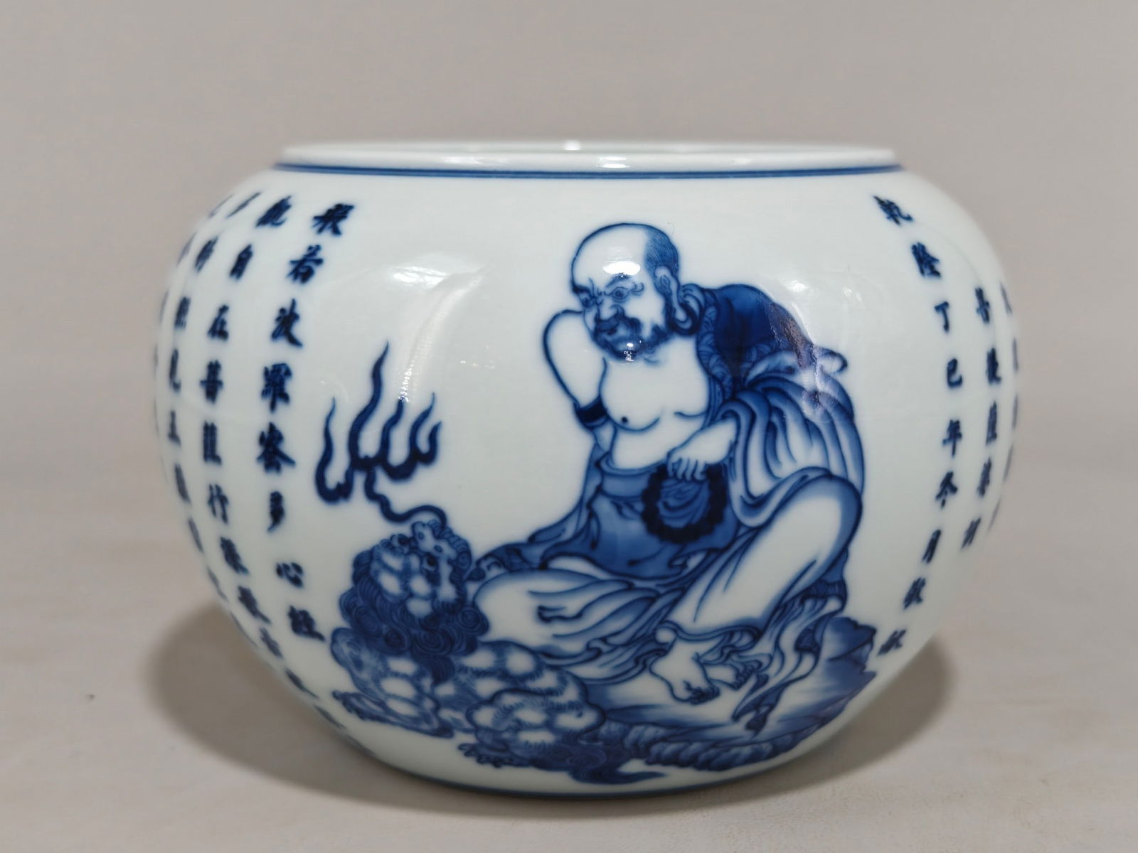 An Exquisite Blue and White Figure Pattern with poem Brush Washer: An Exquisite Blue and White Figure Pattern with poem Brush Washer Qing Dynasty, China Yongzheng Six-character Mark Size:4.1inx5.7in青花心经罗汉笔洗