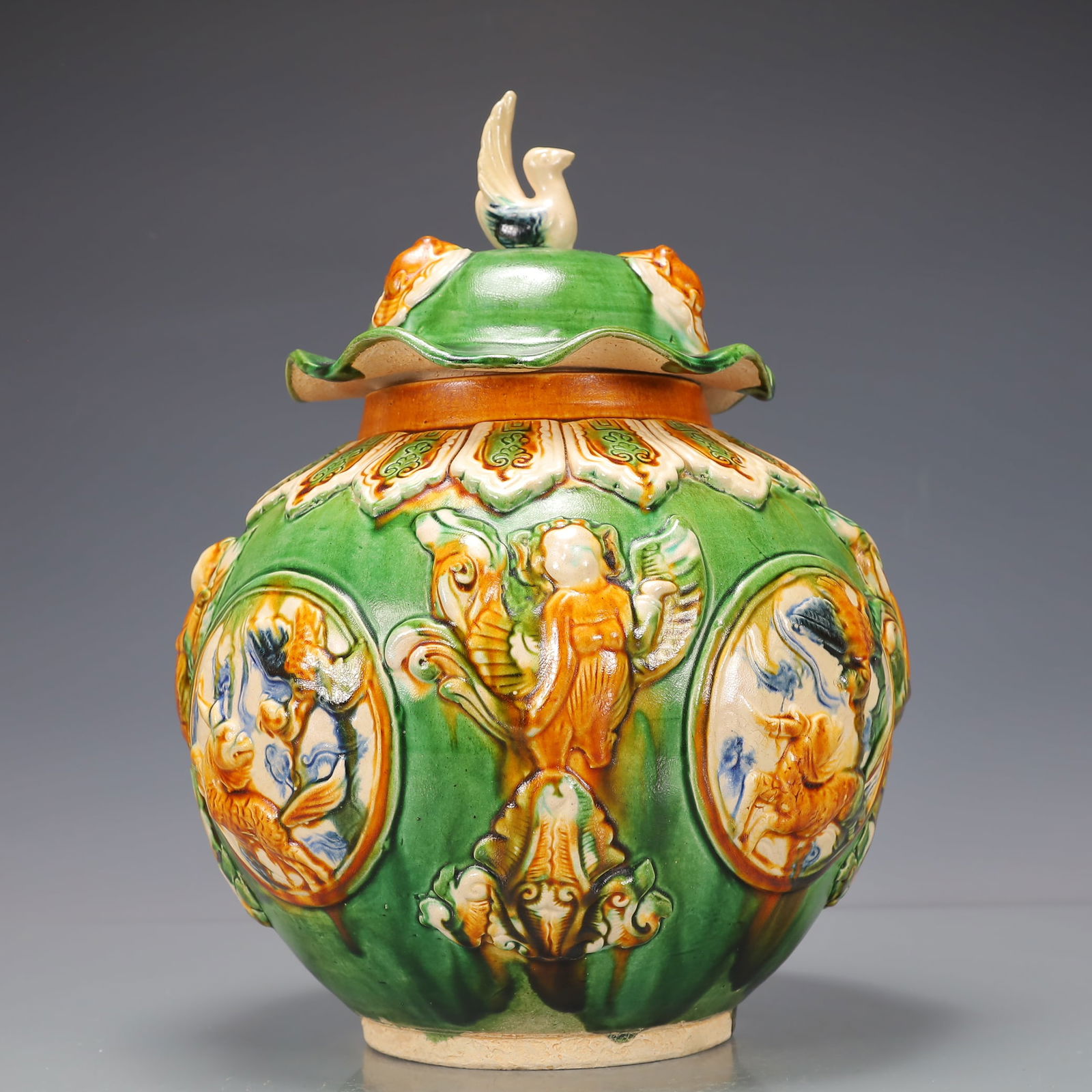 A Exquisite Trio-colored glazed pottery of the Tang Dynasty Character and Story Pattern Jar (1 of 12)