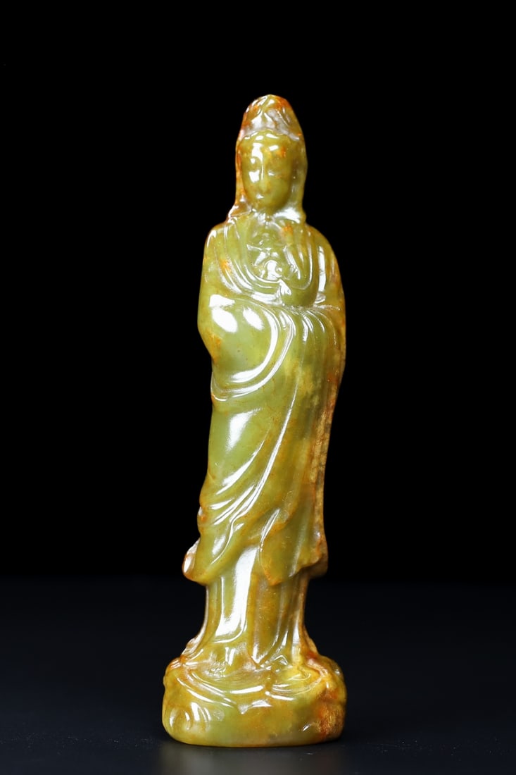 An Exquisite White Jade Statue of Avalokitesvara: An Exquisite White Jade Statue of Avalokitesvara Han Dynasty, China Size:5.7inx1.7inx1.3in Weight:203.5g白玉观音 中国汉代 Size:14.5cmx4.2cmx3.3cm