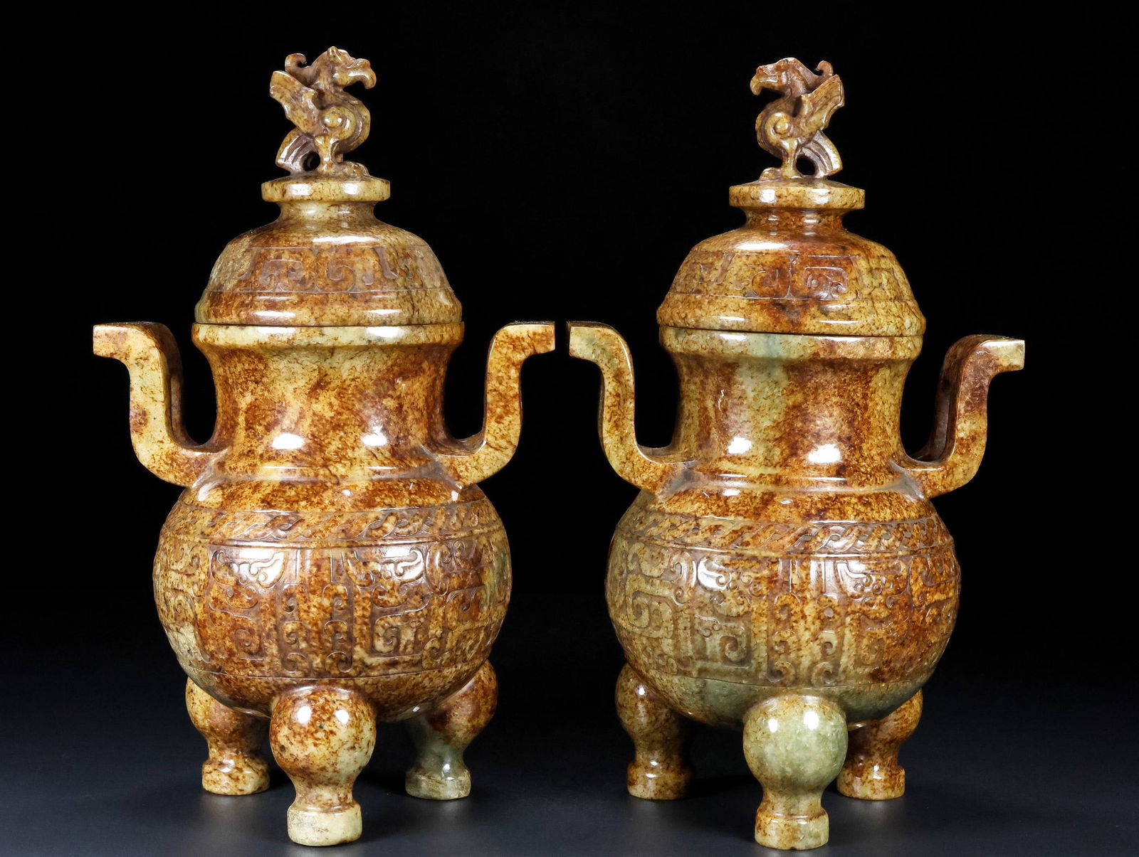 A Pair of Exquisite White Jade Phoenix Pattern Double-Ears and Tripod Censer: A Pair of Exquisite White Jade Phoenix Pattern Double-Ears and Tripod Censer Qing Dynasty, China Size:10.2inx6.3inx4.7in Weight:3668g白玉三足鼎立双耳