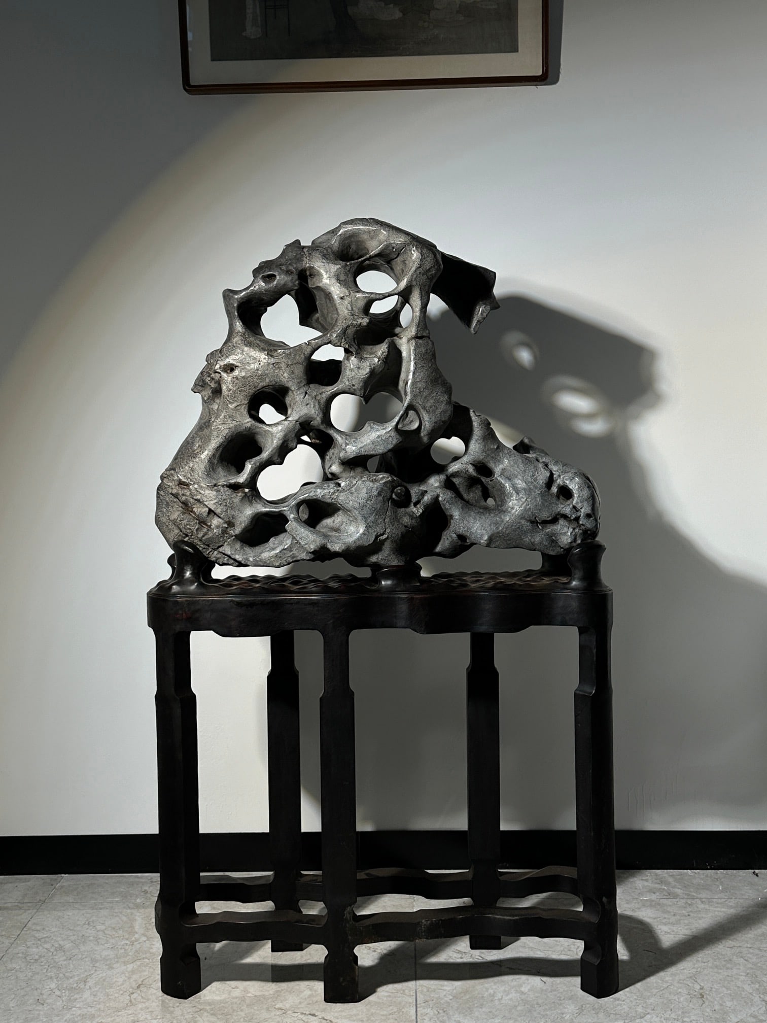 An Exquisite Taihu Stone Ornament: An Exquisite Taihu Stone Ornament Qing Dynasty, China Size:55.1inx32.3inx9.8in太湖石摆件 中国清代 Size:140cmx82cmx25cm