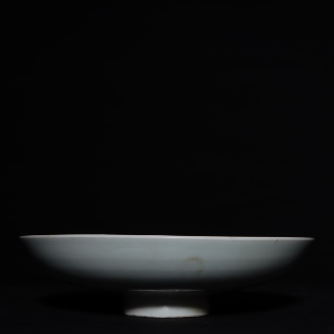 An Exquisite Shufu Glazed Plate: An Exquisite Shufu Glazed Plate Yuan Dynasty, China Size:1.8inx6.9in枢府釉暗刻纹盘 中国元代 Size:4.5cmx17.5cm