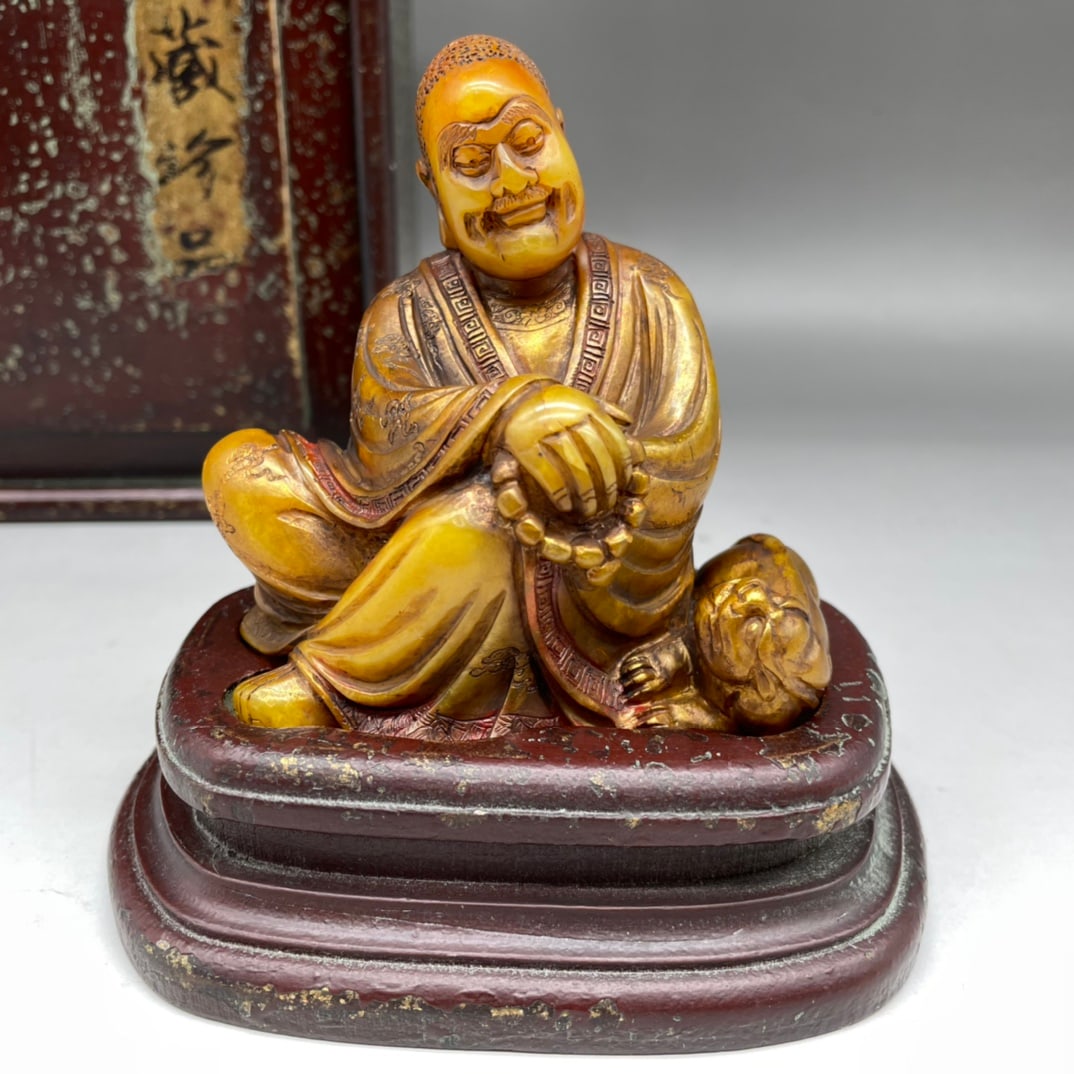 An Exquisite Tianhuang Stone Figure Ornament: An Exquisite Tianhuang Stone Figure Ornament Qing Dynasty, China Size:4.7inx4.7inx3.1in Weight:332.8g田黄石人物摆件 中国清代