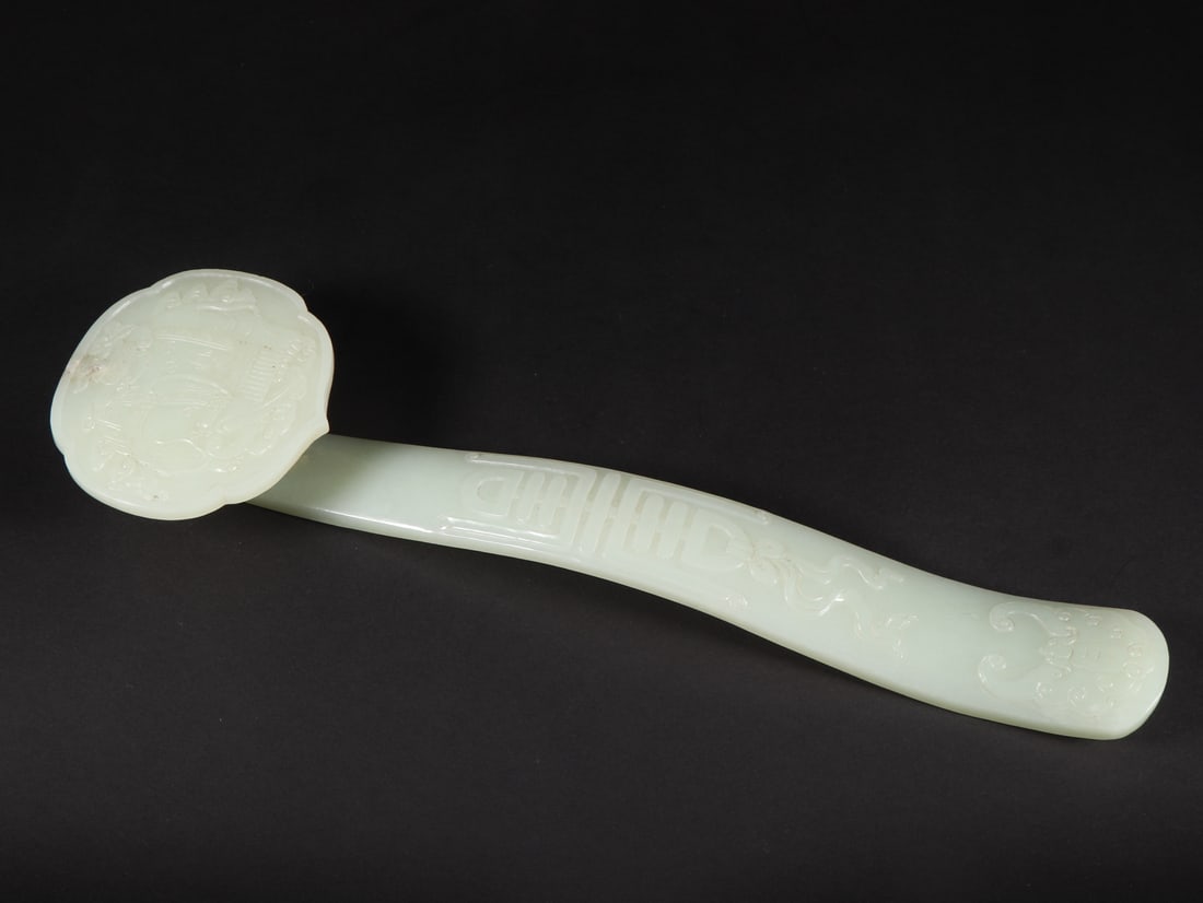 An Exquisite White Jade Elephant Pattern Ruyi: An Exquisite White Jade Elephant Pattern Ruyi Qing Dynasty, China Size:12.6inx3.4inx1.5in Weight:456g白玉太平有象纹如意