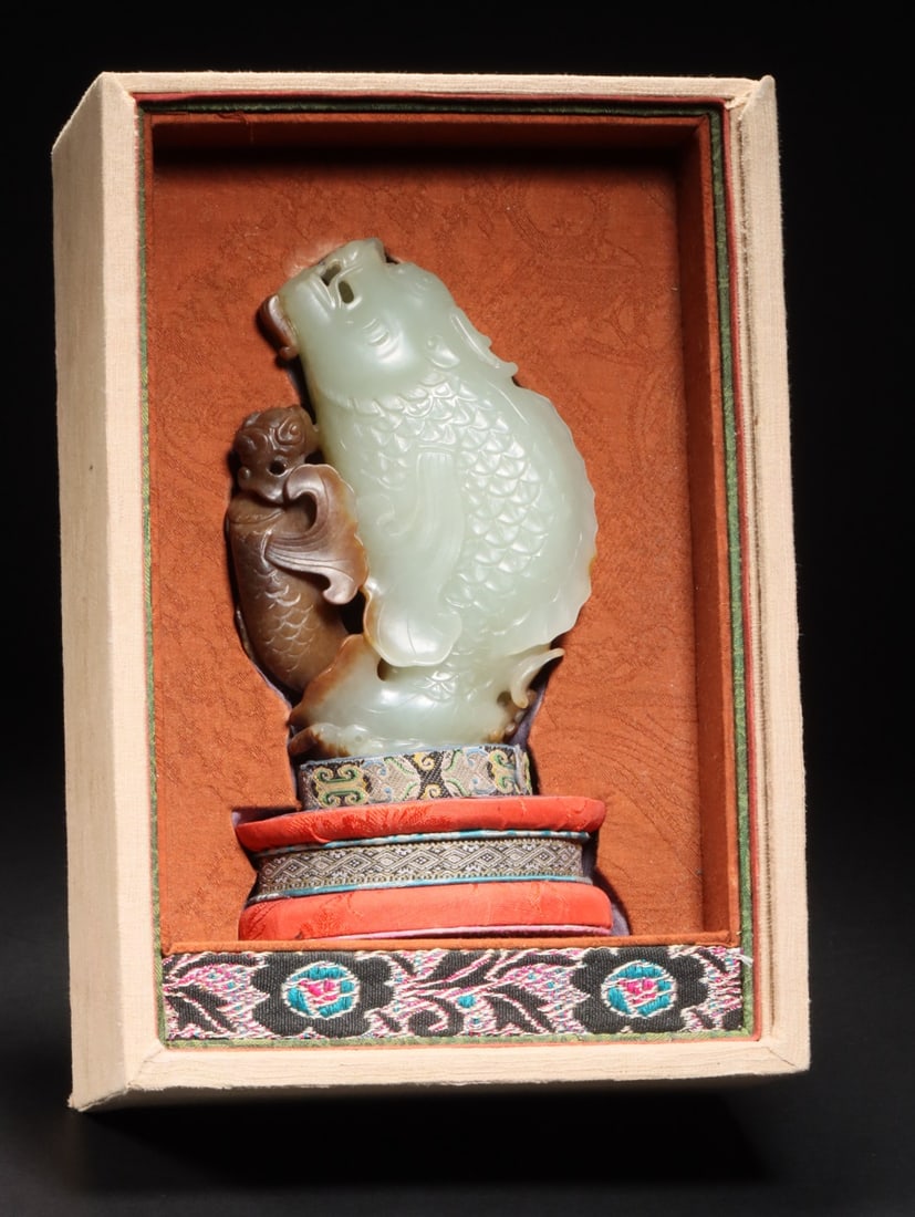 An Exquisite White Jade Auspicious Beast Ornament (1 of 9)