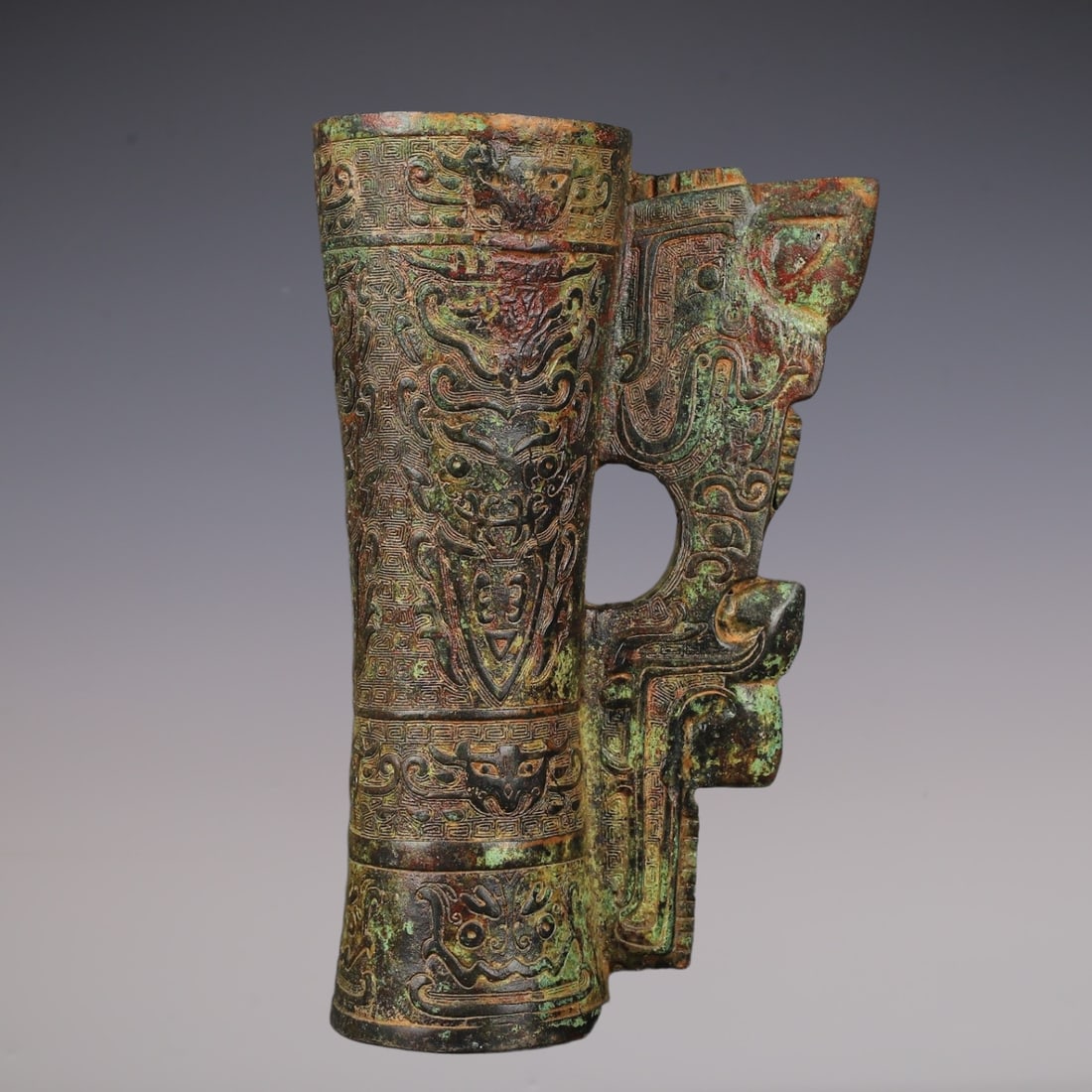 An Exquisite Bronze Beast-Face Pattern Cup: An Exquisite Bronze Beast-Face Pattern Cup W.Zhou , China Size:6.3inx9.4in Weight:1100g青铜鼎杯 西周时期 Size:16cmx24cm Weight:1100g