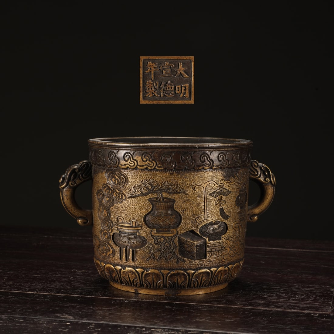 An Exquisite Bronze Character and Story Pattern Double-Ears Censer: An Exquisite Bronze Character and Story Pattern Double-Ears Censer Ming Dynasty, China Xuande Six-character Mark Size:3.7inx5.8in