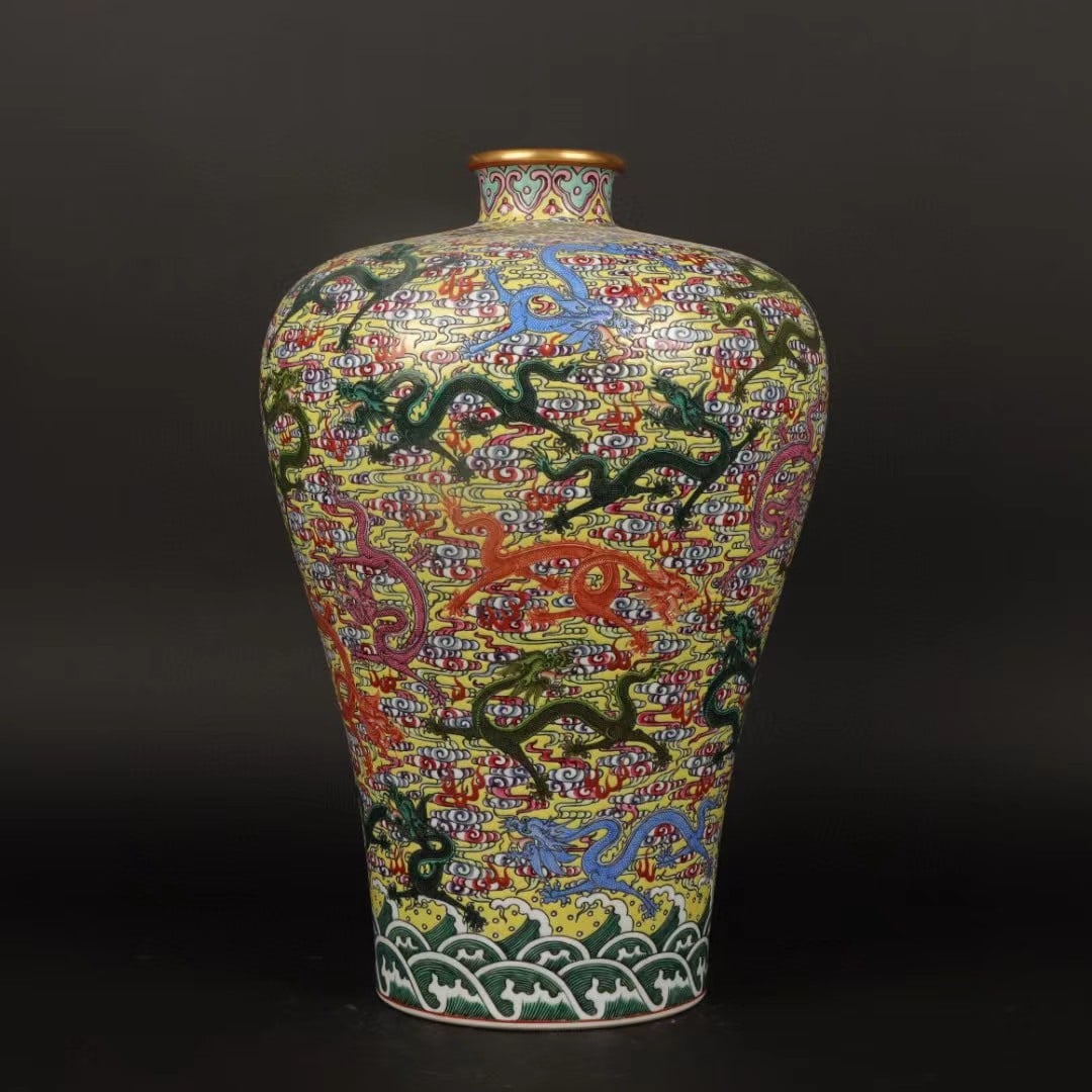 An Exquisite Famille-Rose Painted Gold Dragon Pattern Seawater Pattern Vase: An Exquisite Famille-Rose Painted Gold Dragon Pattern Seawater Pattern Vase Qing Dynasty, China Yongzheng Six-character Mark Size:14.2inx9.6in粉彩描金龙纹梅&#
