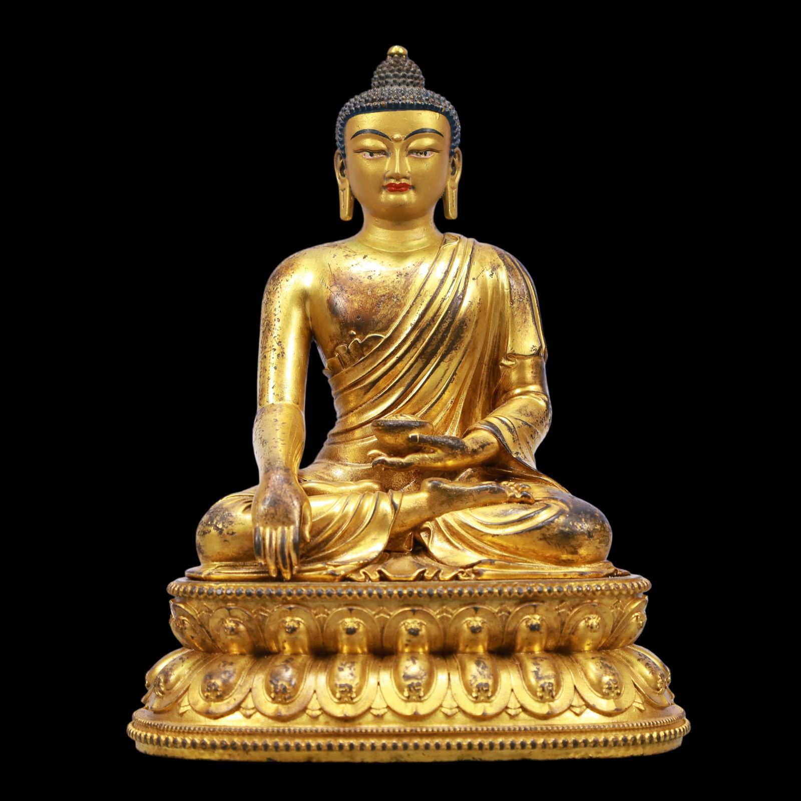 A Exquisite Gilt Bronze Statue of Sakyamuni: A Exquisite Gilt Bronze Statue of Sakyamuni Ming Dynasty, China Xuande Six-character Mark Size:6.3inx4.3inx8.3in Weight:2300g铜鎏金如来 中国明代 &