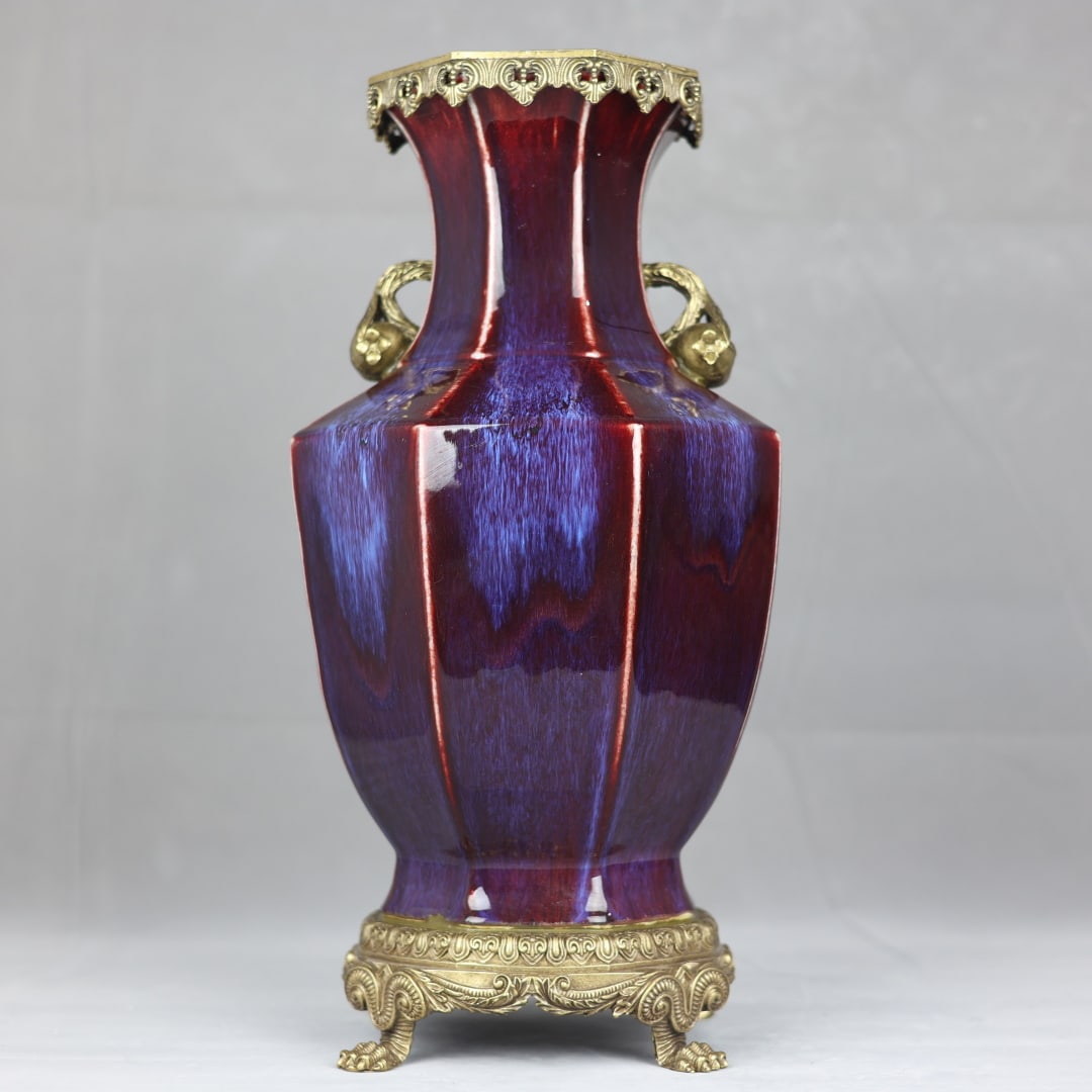 An Exquisite Flambe Glazed Inlaid Bronze Double-Ears Vase: An Exquisite Flambe Glazed Inlaid Bronze Double-Ears Vase Qing Dynasty, China Yongzheng Six-character Mark Size:18.7inx9.1in窑变釉镶铜石榴双耳