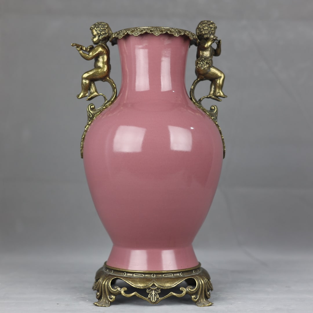 An Exquisite Ruby Red-Glazed Inlaid Bronze Double-Ears Vase: An Exquisite Ruby Red-Glazed Inlaid Bronze Double-Ears Vase Qing Dynasty, China Yongzheng Six-character Mark Size:15.6inx7.5in胭脂红釉镶铜天使耳&#