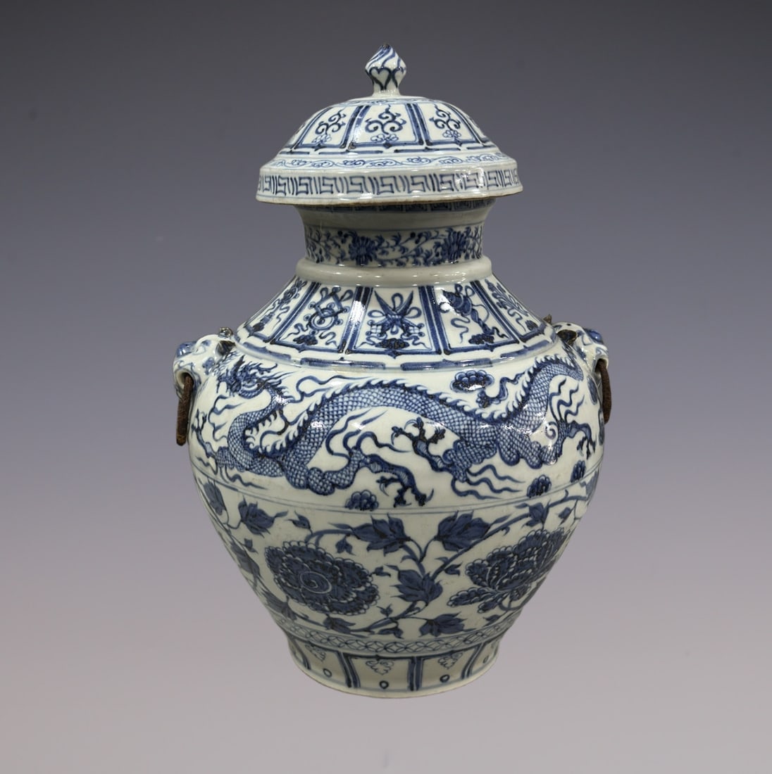 An Exquisite Blue and White Lotus Pattern Eight Treasures Pattern Dragon Pattern Double-Ears Jar: An Exquisite Blue and White Lotus Pattern Eight Treasures Pattern Dragon Pattern Double-Ears Jar Yuan Dynasty, China Size:18.5in青花缠枝莲龙纹罐