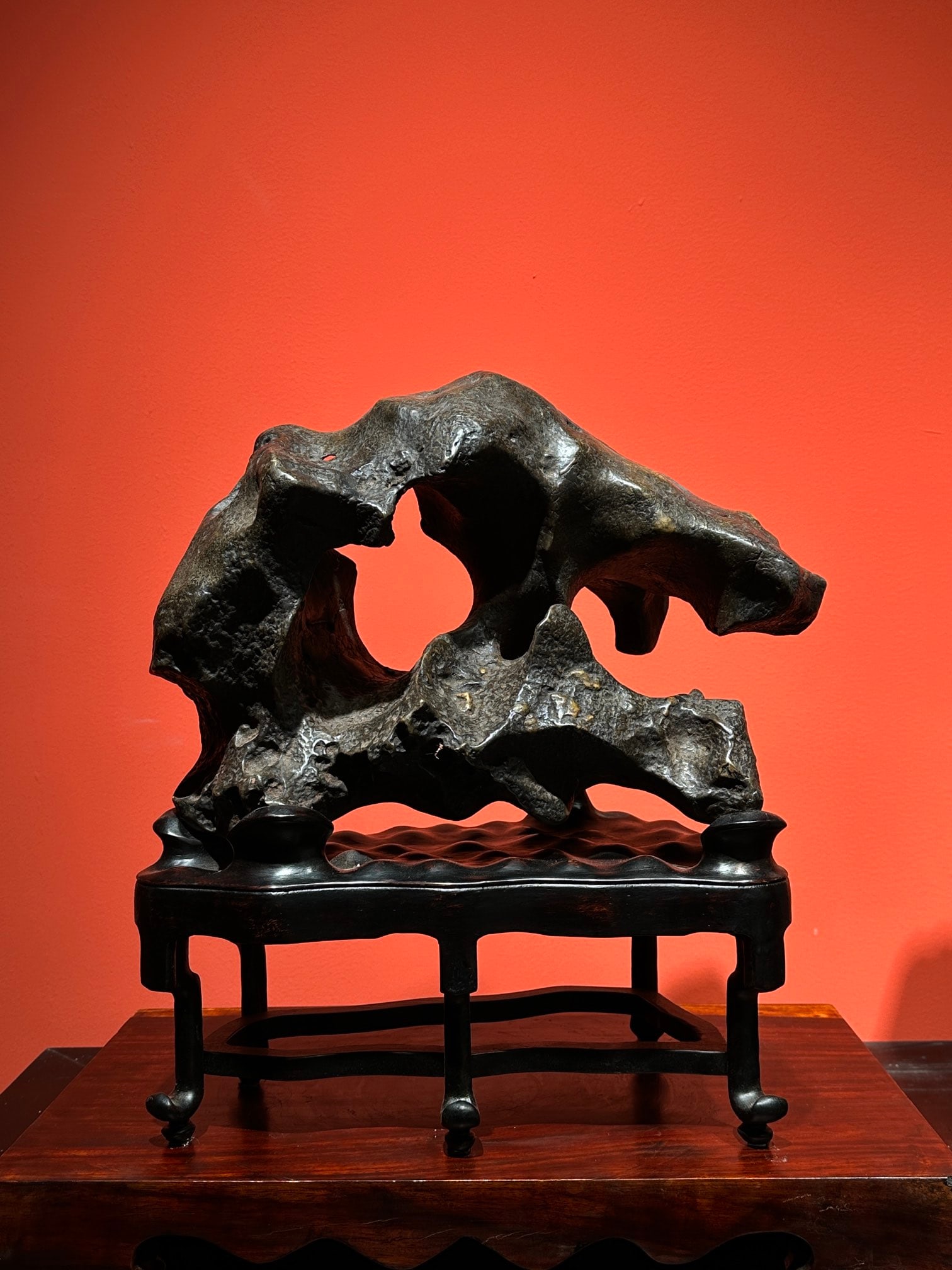 An Exquisite Taihu Stone Ornament: An Exquisite Taihu Stone Ornament Qing Dynasty, China Size:16.5inx15inx8.3in太湖石卧雲摆件 中国清代 Size:42cmx38cmx21cm