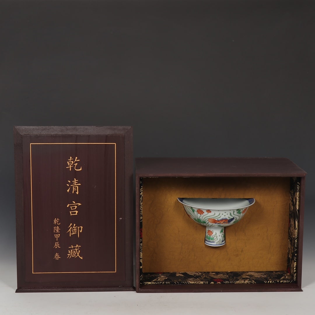 An Exquisite Wucai Blue and White Fish and Lotus Pattern Cup: An Exquisite Wucai Blue and White Fish and Lotus Pattern Cup Ming Dynasty, China Xuande Four-character Mark Size:4.5inx7.3in青花五彩鱼藻莲池纹'