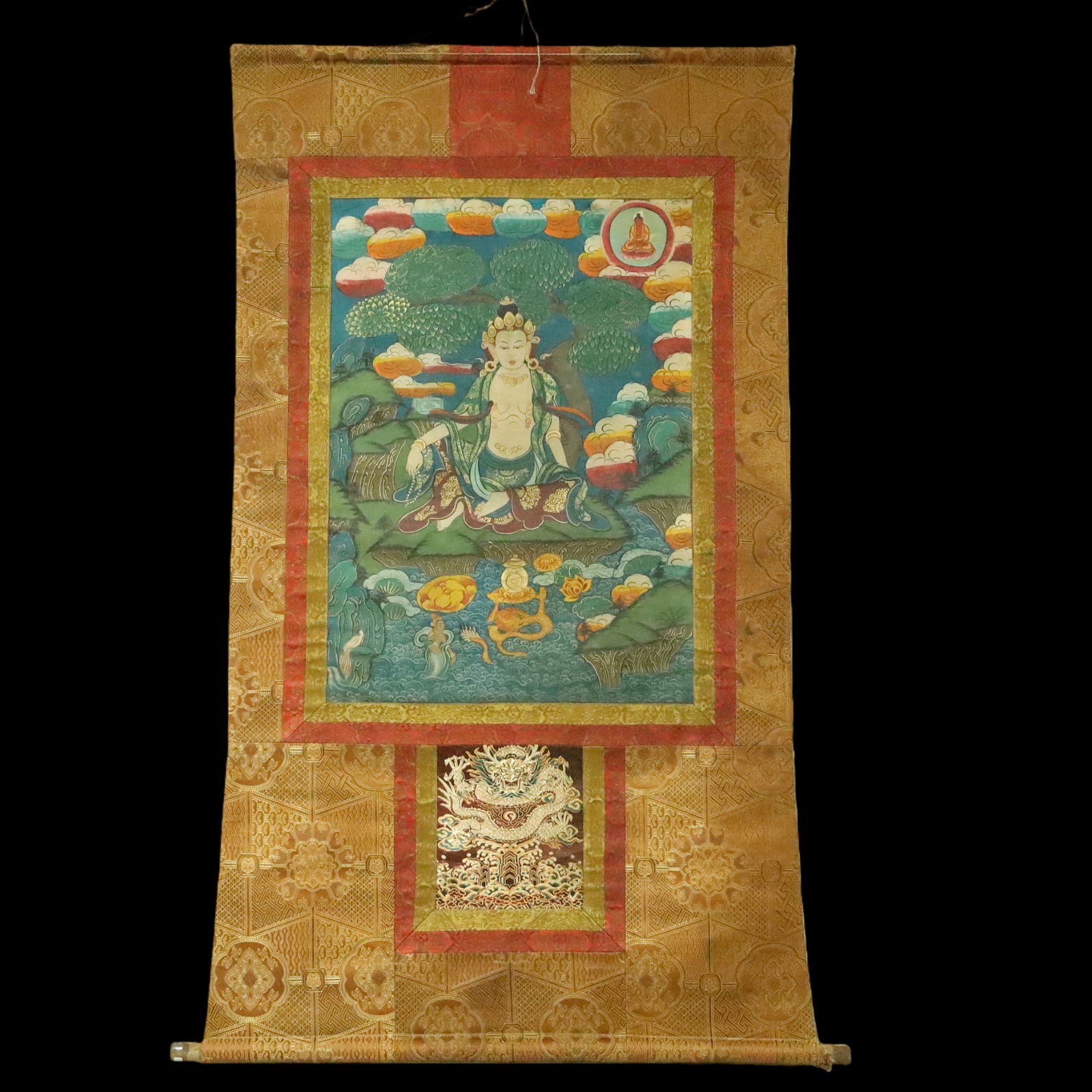 An Exquisite Brocade Painted Color Statue of Avalokitesvara Tangka: An Exquisite Brocade Painted Color Statue of Avalokitesvara Tangka Ming Dynasty, China Size:35inx59.1in织锦彩绘观音唐卡