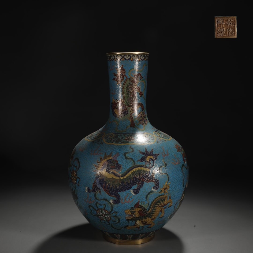 An Exquisite Cloisonne Lotus Pattern Lion Pattern Vase: An Exquisite Cloisonne Lotus Pattern Lion Pattern Vase Qing Dynasty, China Qianlong Four-character Mark Size:16.5inx11in