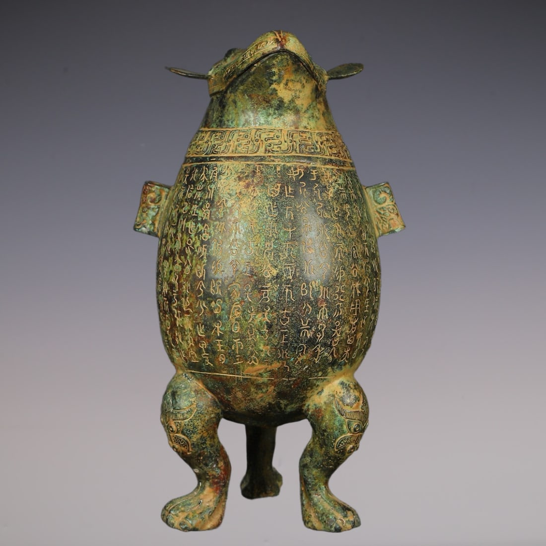 An Exquisite Bronze With Inscription Bird-Shaped Ewer: An Exquisite Bronze With Inscription Bird-Shaped Ewer W.Zhou , China Size:9.8inx17.7in Weight:6000g青铜铭文鸟面壶 西周时期 Size:25cmx4