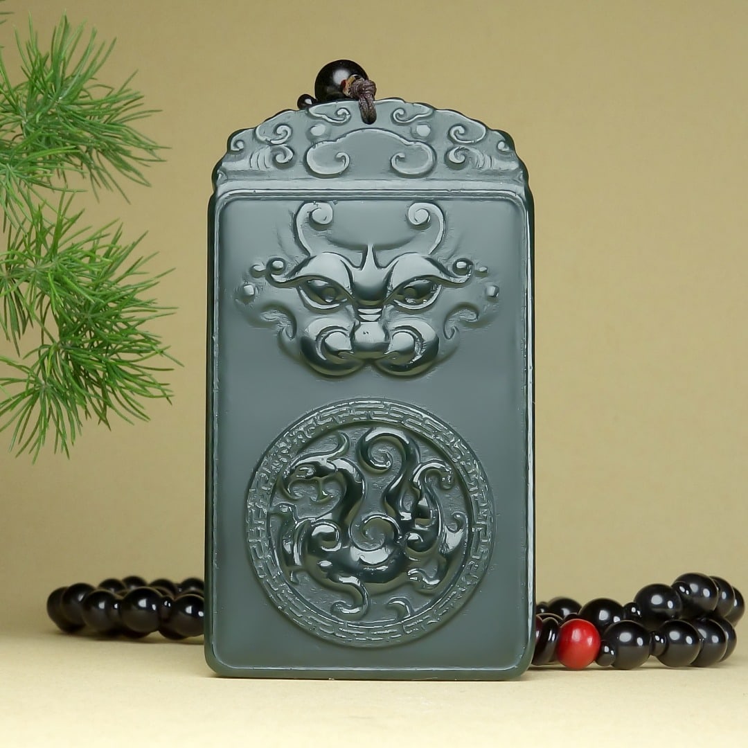 An Exquisite Greenish Jade Auspicious Beast Pendant: An Exquisite Greenish Jade Auspicious Beast Pendant,Size:64mmx36mmx9mm 青玉貔貅挂件