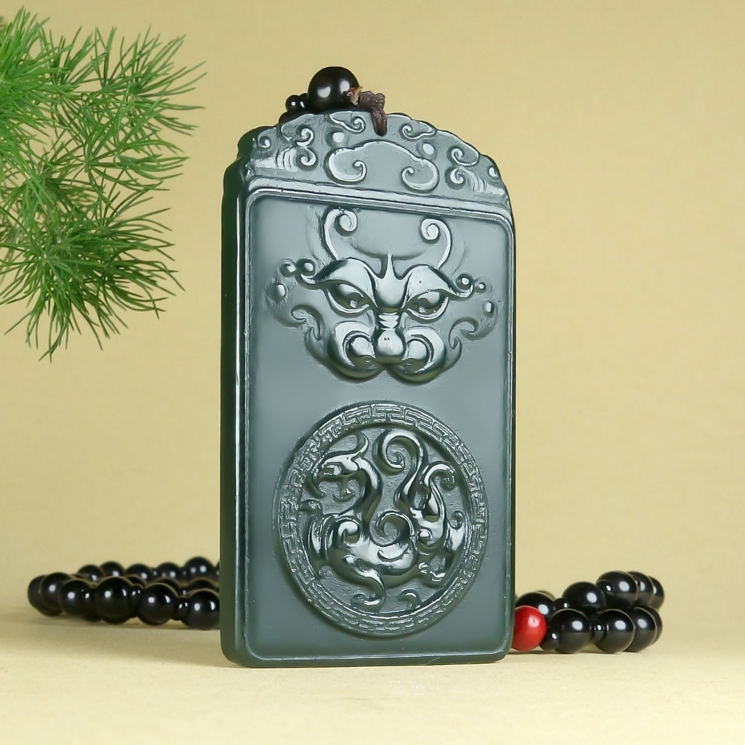 An Exquisite Greenish Jade Auspicious Beast Pendant - 2
