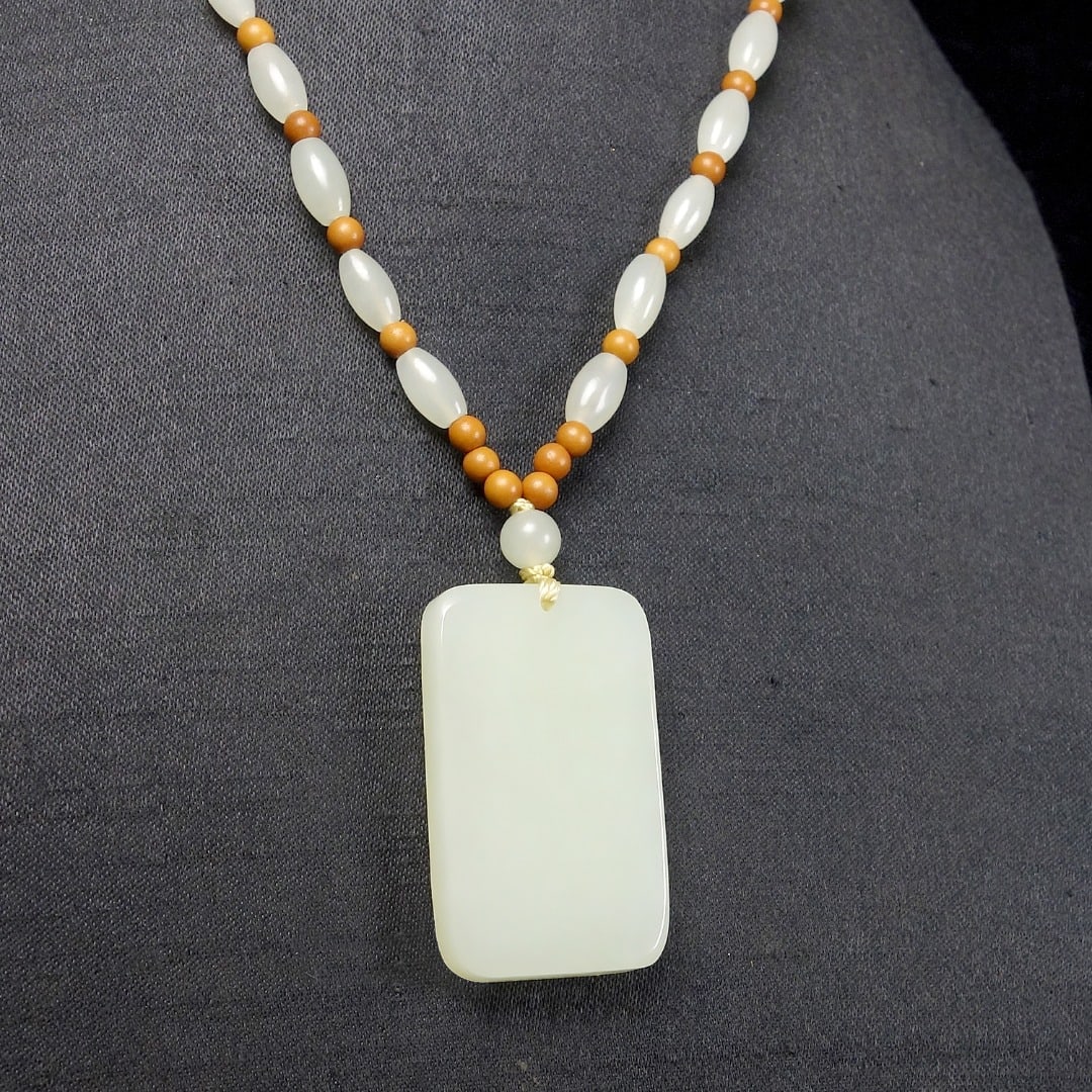 An Exquisite White Jade Pendant: An Exquisite White Jade Pendant,Size:38mmx23mmx6.5mm 白玉挂件