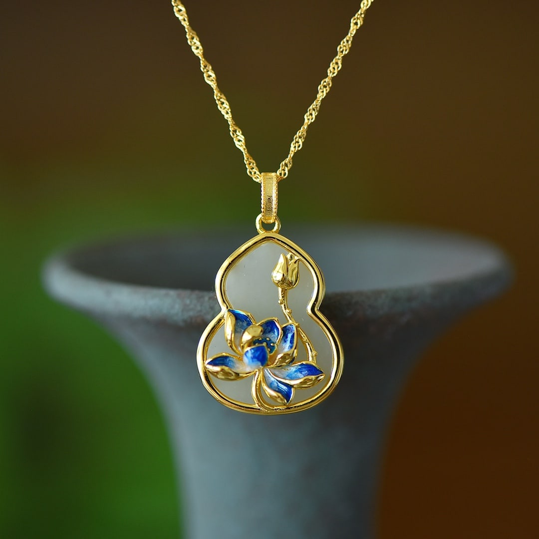 An Exquisite Sterling Silver-Gold Plated Inlaid White Jade Enamel Gourd Pendant: An Exquisite Sterling Silver-Gold Plated Inlaid White Jade Enamel Gourd Pendant Size:16mmx20mm 