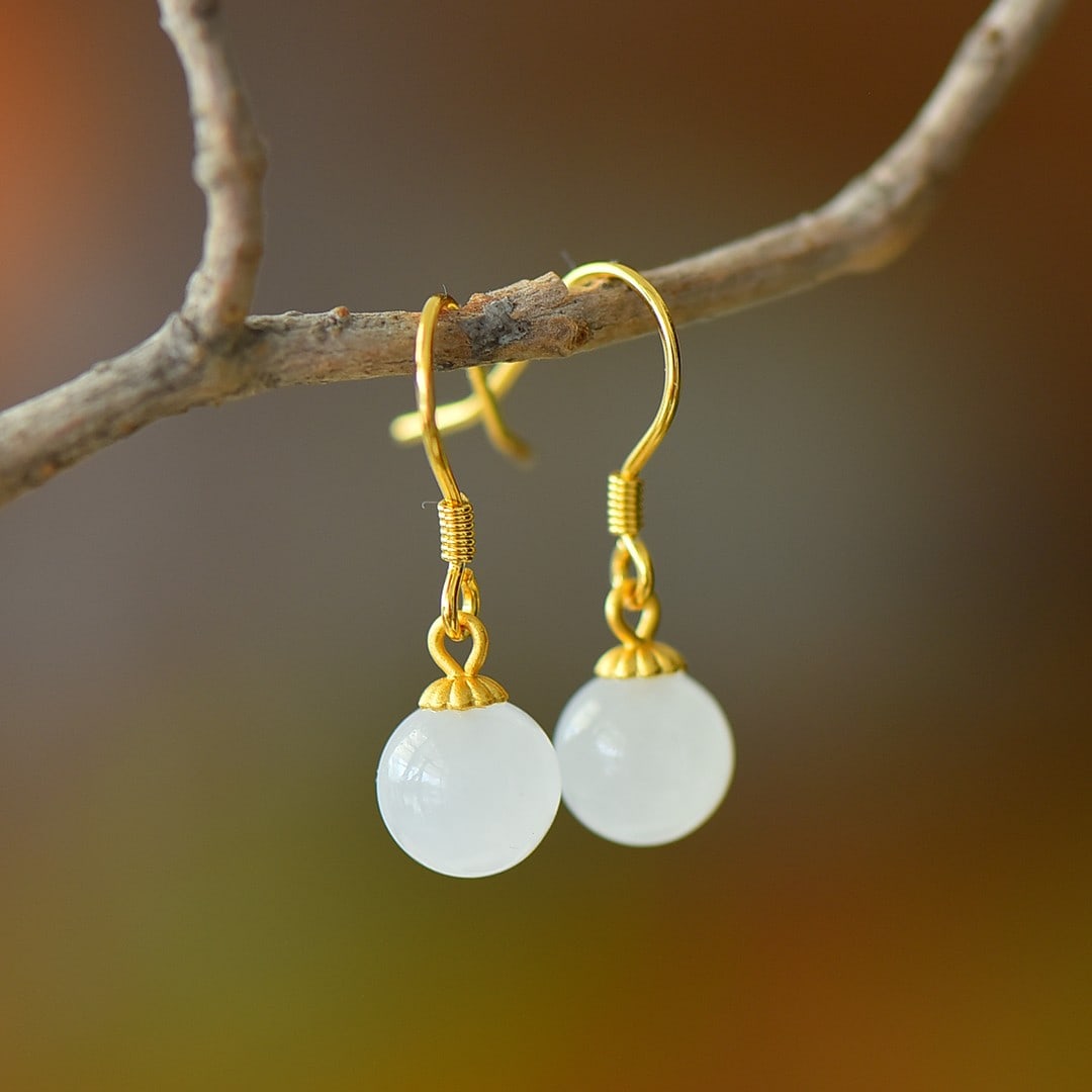 A Pair of Exquisite Sterling Silver-Gold Plated Inlaid White Jade Earrings: A Pair of Exquisite Sterling Silver-Gold Plated Inlaid White Jade Earrings 一对纯银镀金镶白玉耳环
