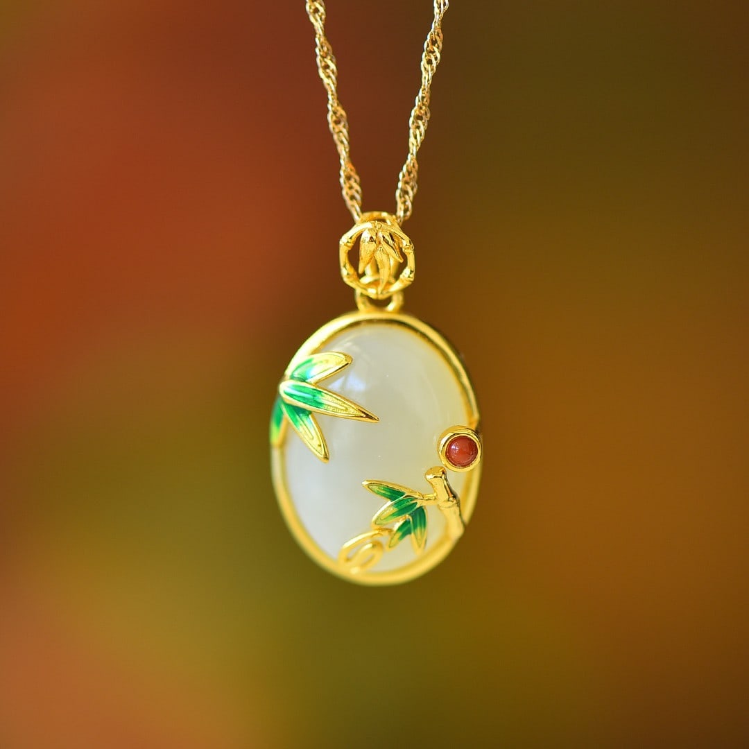 An Exquisite Sterling Silver-Gold Plated Inlaid White Jade Pendant: An Exquisite Sterling Silver-Gold Plated Inlaid White Jade Pendant,Size:13mmx18mm 纯银镀金镶白玉吊坠