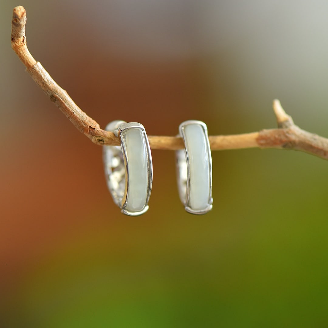 A Pair of Exquisite Sterling Silver Inlaid White Jade Earrings: A Pair of Exquisite Sterling Silver Inlaid White Jade Earrings 一对纯银镶白玉耳环