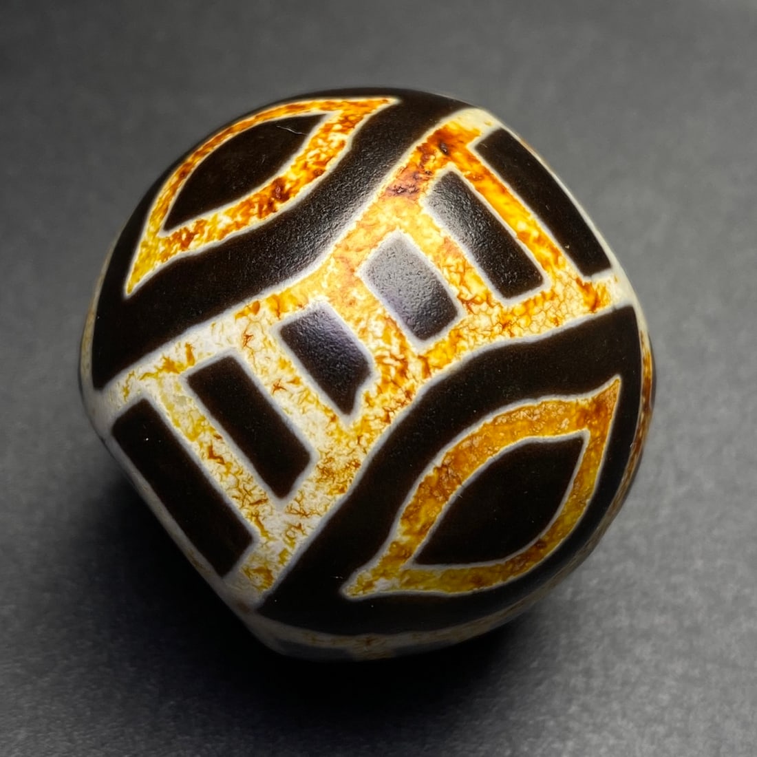 An Exquisite Four Eyes Dzi Bead Pendant: An Exquisite Four Eyes Dzi Bead Pendant,Size:33mmx28mm,Weight:44.7g 四眼天珠挂件