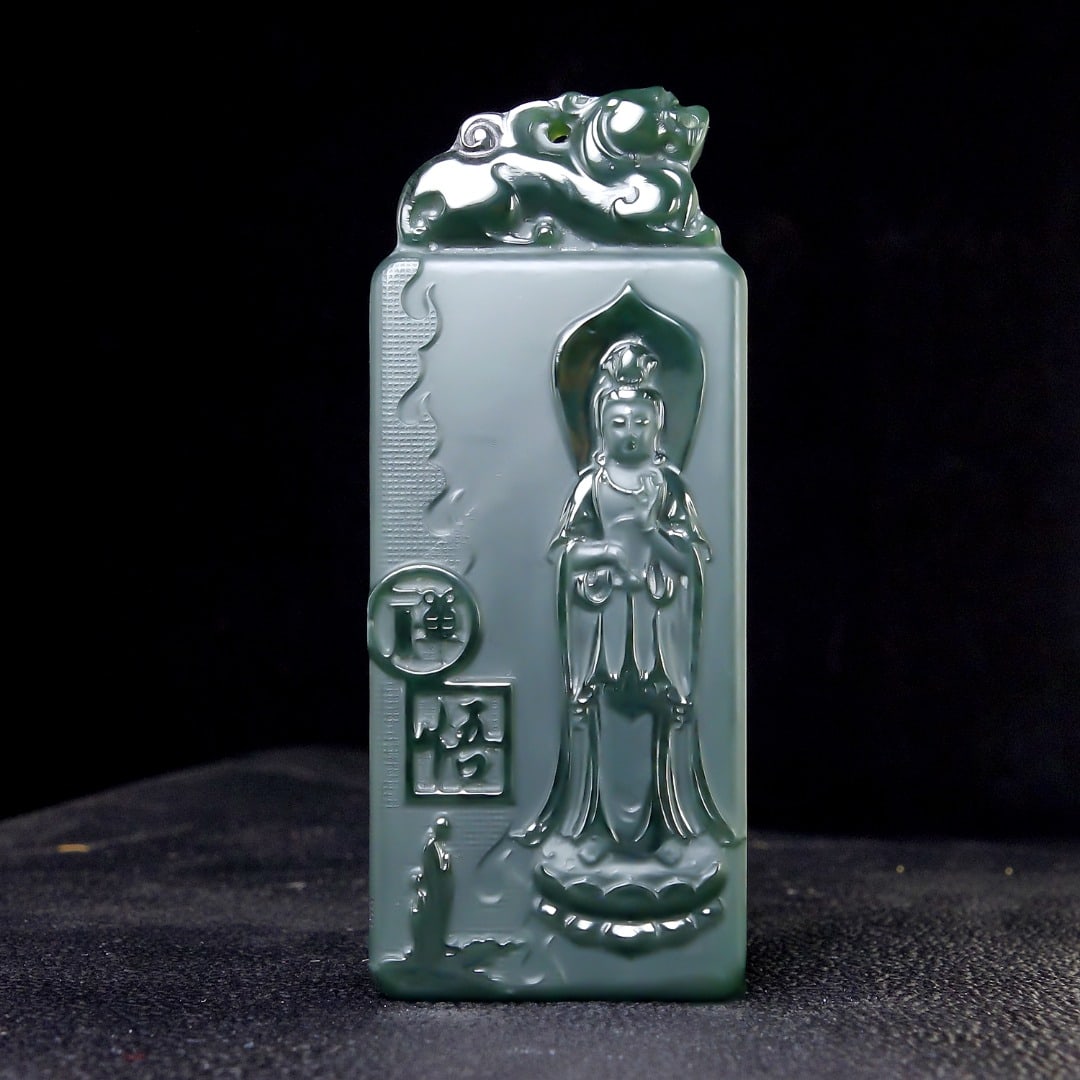 An Exquisite Greenish Jade Statue of Avalokitesvara Pendant: An Exquisite Greenish Jade Statue of Avalokitesvara Pendant,Size:64mmx27mmx8mm 青玉观音像挂件