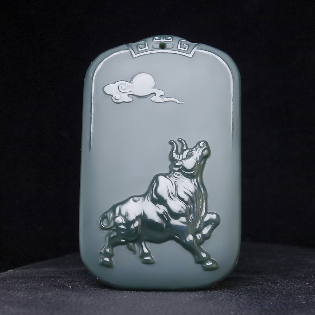 An Exquisite Greenish Jade Buffalo Pattern Pendant: An Exquisite Greenish Jade Buffalo Pattern Pendant,Size:64mmx40mmx11mm 青玉牛纹挂件