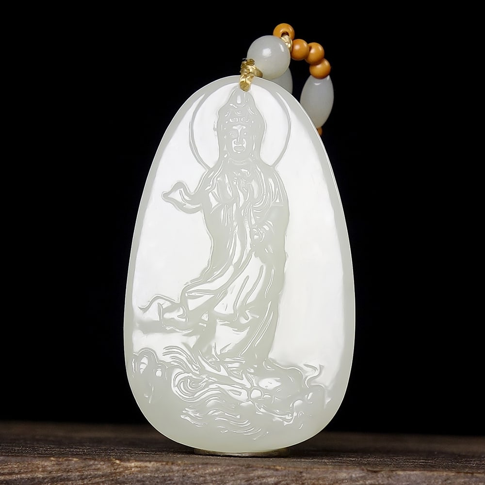 An Exquisite White Jade Statue of Avalokitesvara Pendant: An Exquisite White Jade Statue of Avalokitesvara Pendant,Size:50mmx30mmx8mm 白玉观音像挂件