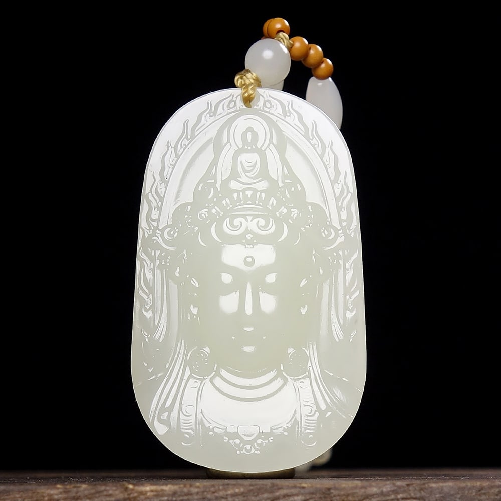 An Exquisite White Jade Statue of Avalokitesvara Pendant: An Exquisite White Jade Statue of Avalokitesvara Pendant,Size:49mmx30mmx9mm 白玉观音像挂件