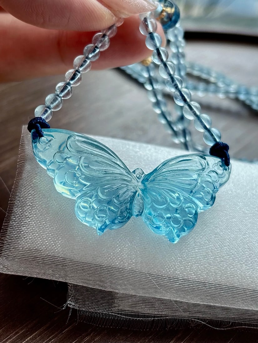 An Exquisite Aquamarine Butterfly Pendant: An Exquisite Aquamarine Butterfly Pendant,Size:46mmx25mm,Total Weight:21g 海蓝宝蝴蝶吊坠