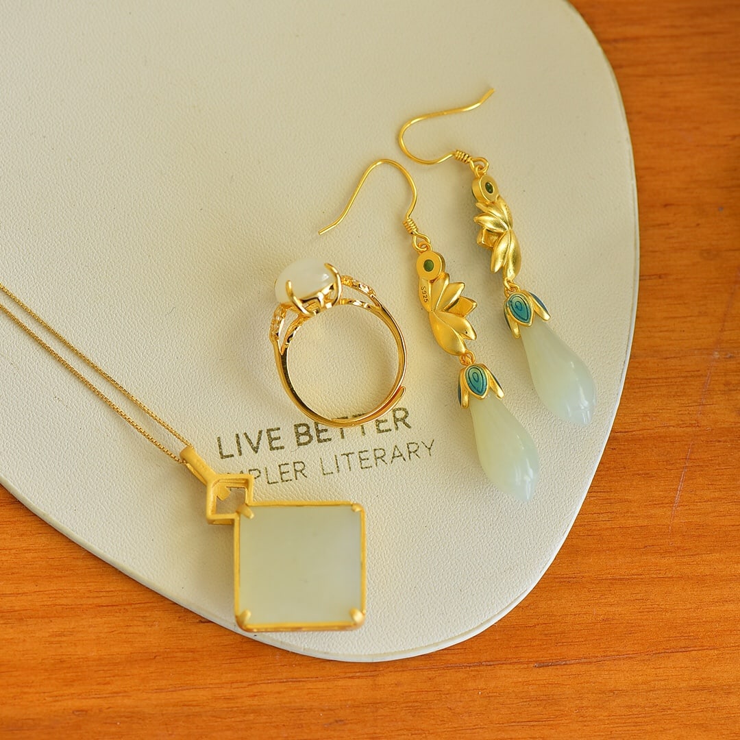 A Set of Fine Sterling Silver-Gold Plated Inlaid White Jade Jewelrys: A Set of Fine Sterling Silver-Gold Plated Inlaid White Jade Jewelrys,Size:9mmx21mm,18mmx18mm,10mmx14mm 一套纯银镀金镶白玉首饰