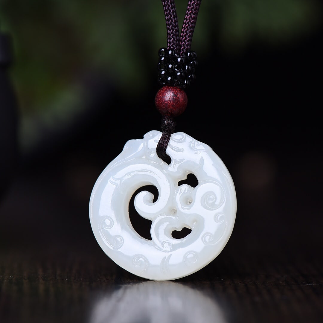 An Exquisite White Jade Dragon Pendant: An Exquisite White Jade Dragon Pendant,Size:30mmx30mm 白玉龙吊坠