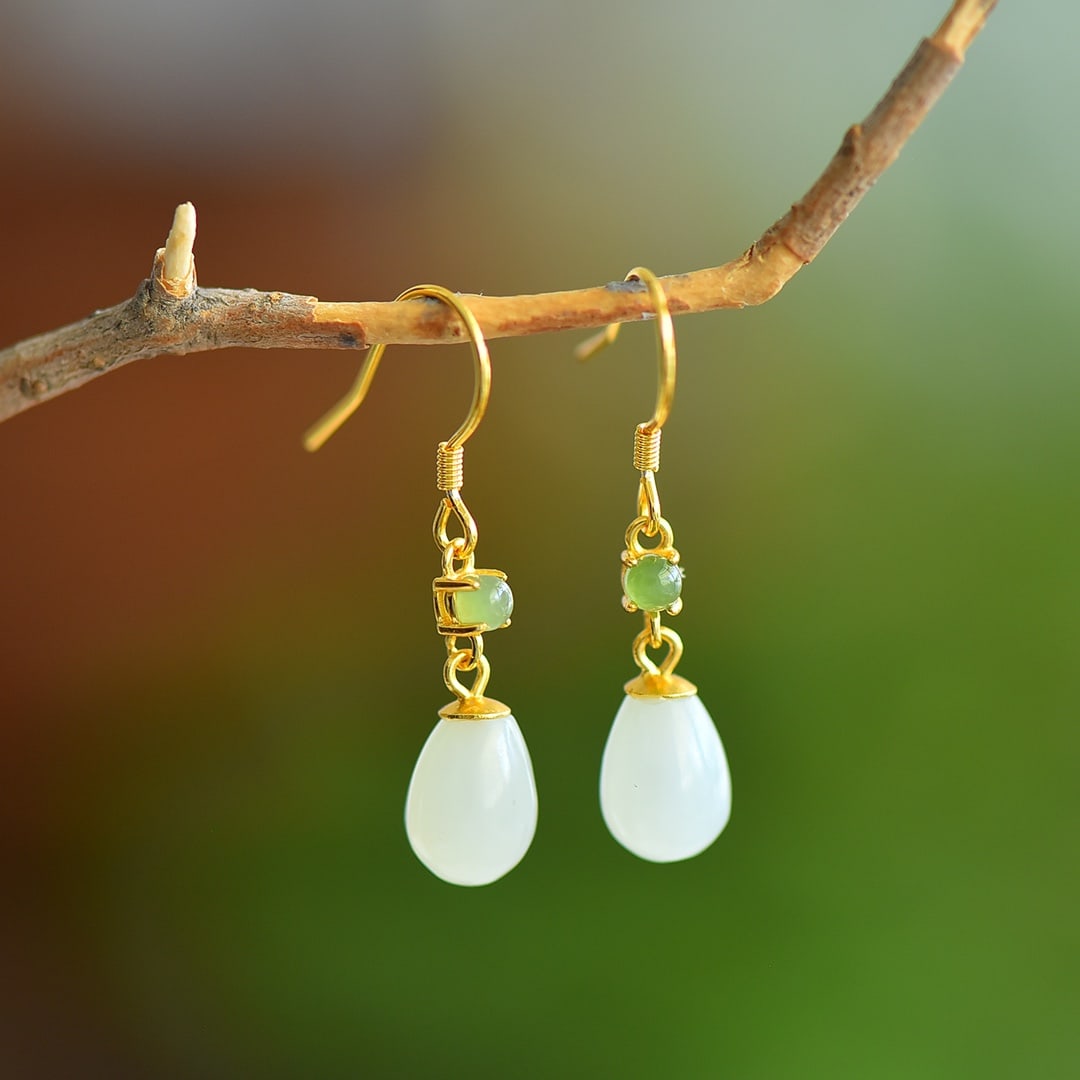 A Pair of Exquisite Sterling Silver-Gold Plated Inlaid White Jade Earrings: A Pair of Exquisite Sterling Silver-Gold Plated Inlaid White Jade Earrings, 一对纯银镀金镶白玉耳环