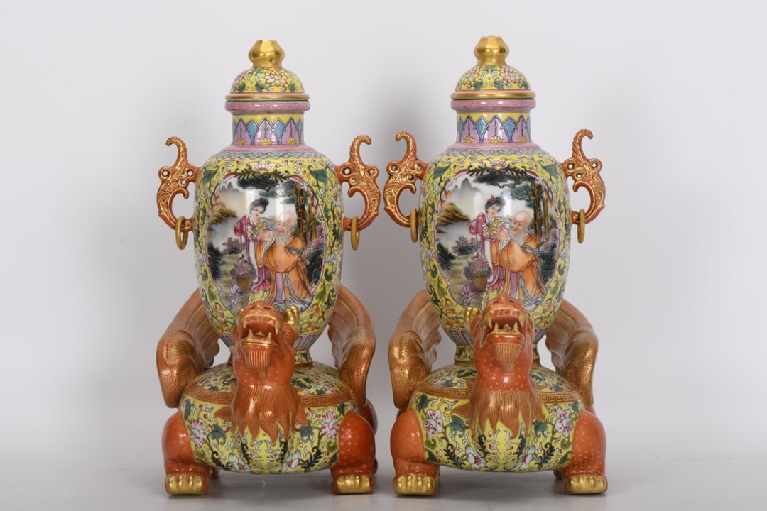 A Pair of Exquisite Famille-Rose Yellow-Ground Gilt Figure-Pattern Double-Ears Jars: A Pair of Exquisite Famille-Rose Yellow-Ground Gilt Figure-Pattern Double-Ears Jars,Qing Dynasty, China,Qianlong Four-character Mark,Size:12.2inx2.2inx10.6inx5.5in 