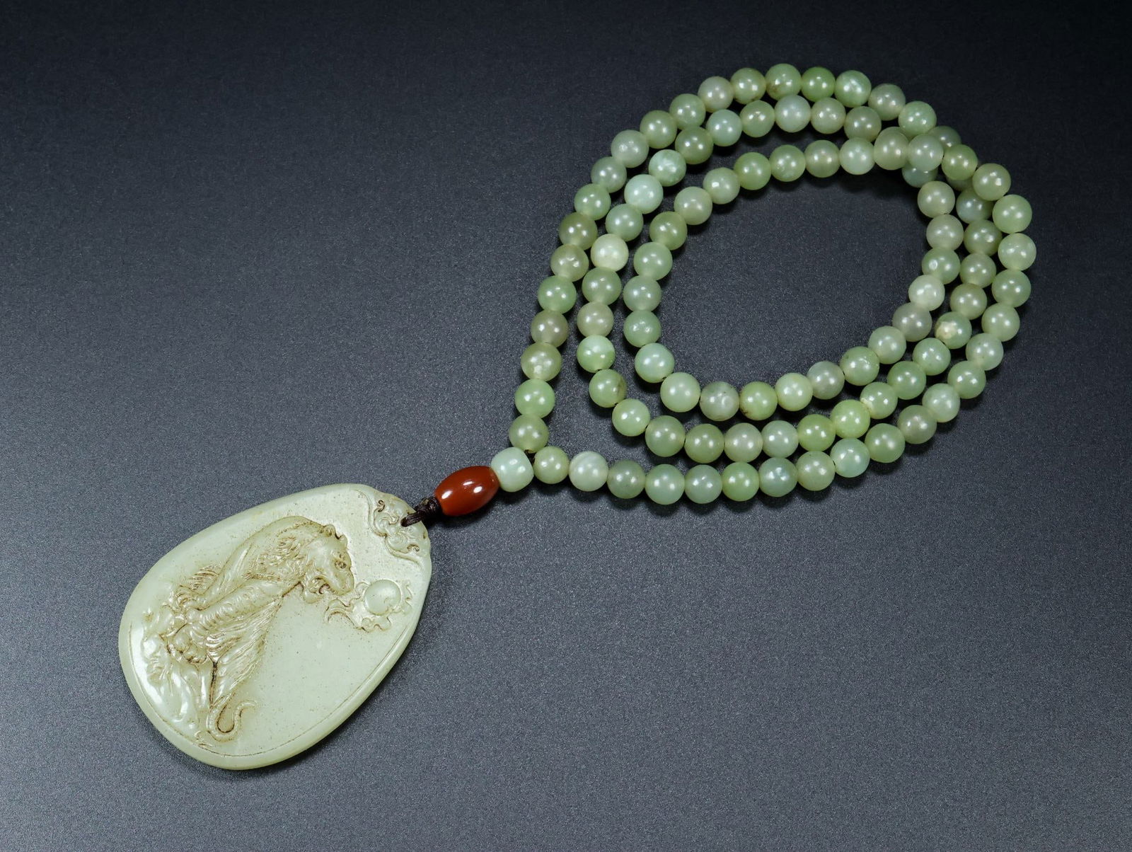 A Exquisite Hotan Jade Tiger Brand: A Exquisite Hotan Jade Tiger Brand,Qing Dynasty, China,Size:2.4inx1.8inx0.3in 和田玉虎牌,中国清代