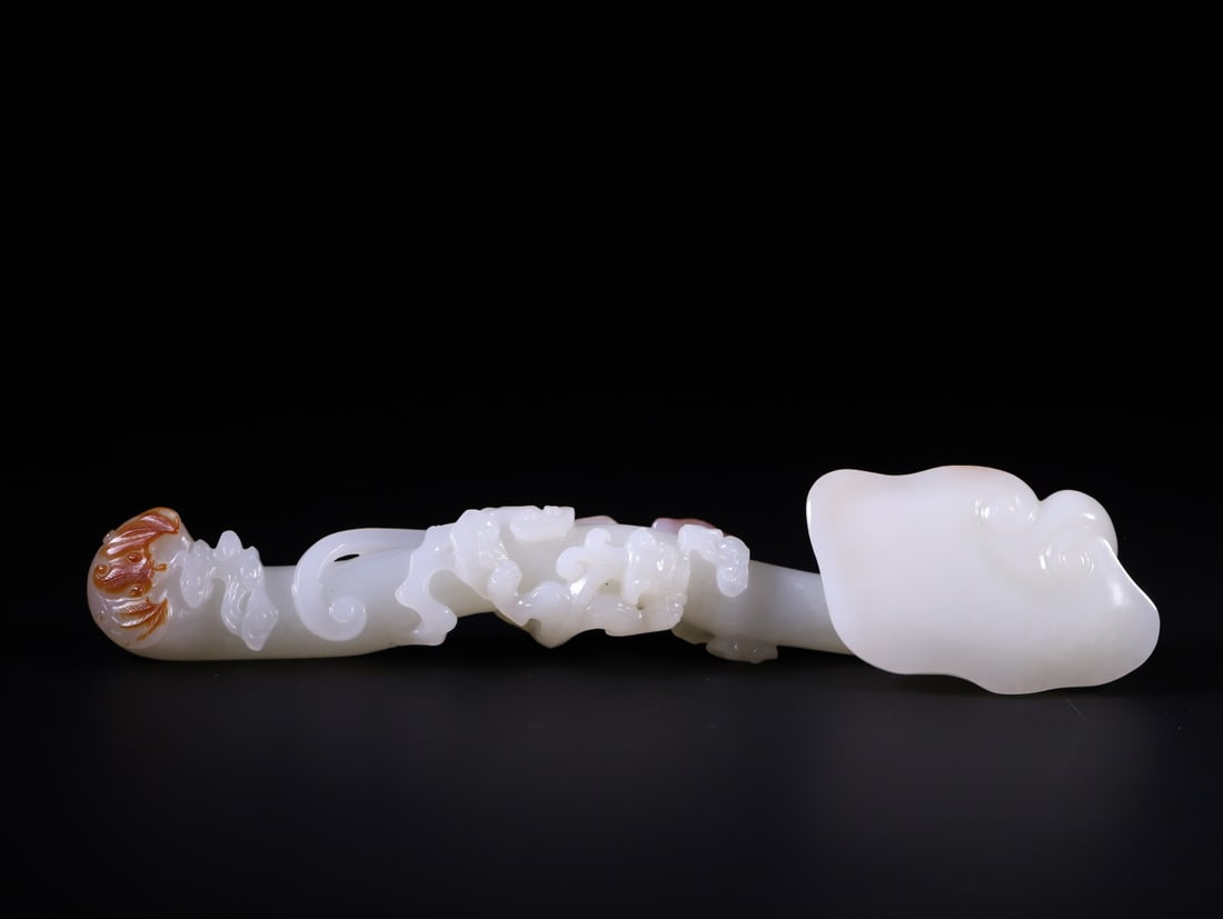 A Exquisite Hotan Jade Ruyi Ornament: A Exquisite Hotan Jade Ruyi Ornament,Qing Dynasty, China,Size:7.9inx1.6inx1.1in,1.1inx0.9in,Weight:184.3g 和田玉如意摆件,中国清代