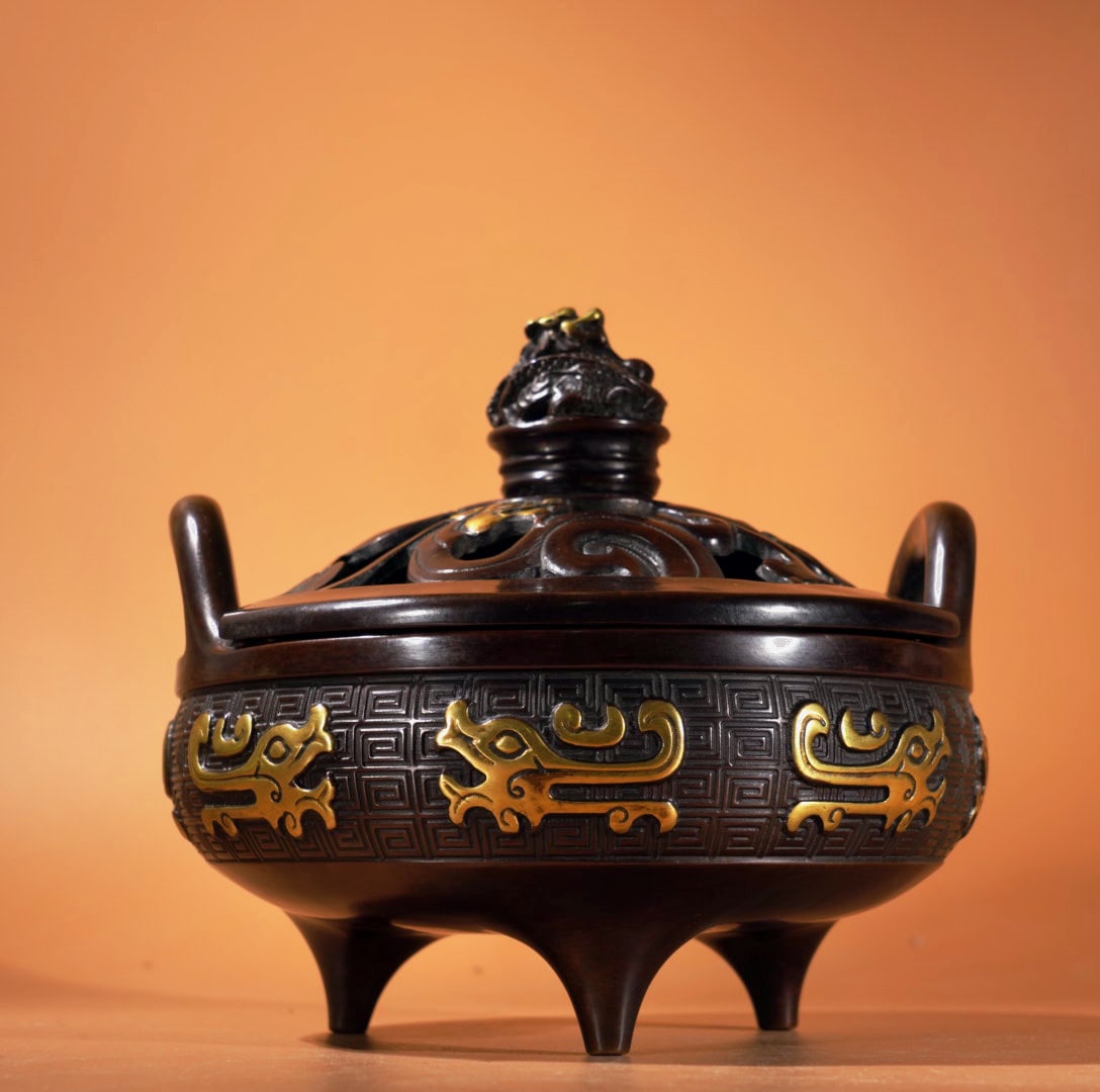 A Exquisite Gilt Bronze Double-Ears Censer: A Exquisite Gilt Bronze Double-Ears Censer,Ming Dynasty, China,Xuande Six-character Mark,Size:5.5inx6in,Weight:2360g 