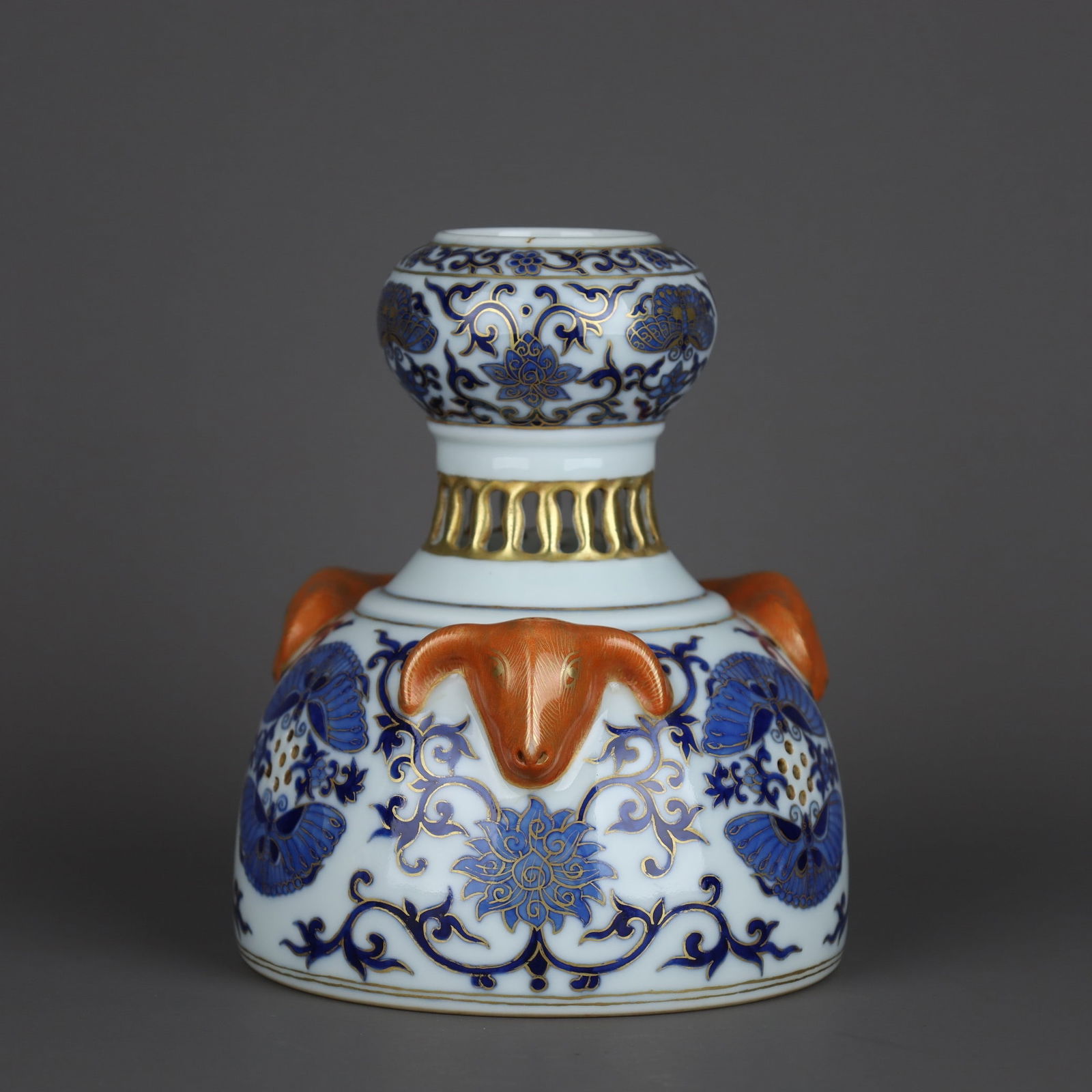 A Exquisite Blue and White Painted Gold Hollow Lotus Pattern Sheep-Head Vase: A Exquisite Blue and White Painted Gold Hollow Lotus Pattern Sheep-Head Vase,Qing Dynasty, China,Qianlong Six-character Mark,Size:5.9inx5.2in 