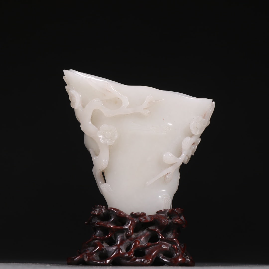 A Exquisite Hotan Jade Plum Flower Pattern Cup: A Exquisite Hotan Jade Plum Flower Pattern Cup,Qing Dynasty, China,Size:5.1inx3.9in,Weight:241.7g 和田玉梅花纹杯,中国清代