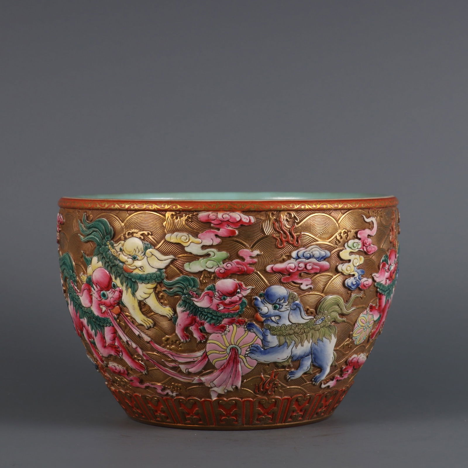 A Rare Gold Ground Carved Sea Water Color Lion Playing with Ball Pattern Vat: A Rare Gold Ground Carved Sea Water Color Lion Playing with Ball Pattern Vat,Qing Dynasty, China,Qianlong Six-character Mark,Size:5inx7.6in 