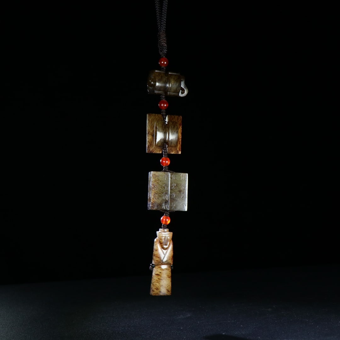 A Exquisiten Hotan Jade Figures Shaped Pendant: A Exquisiten Hotan Jade Figures Shaped Pendant,Han Dynasty, China 和田玉人形挂件,中国汉代