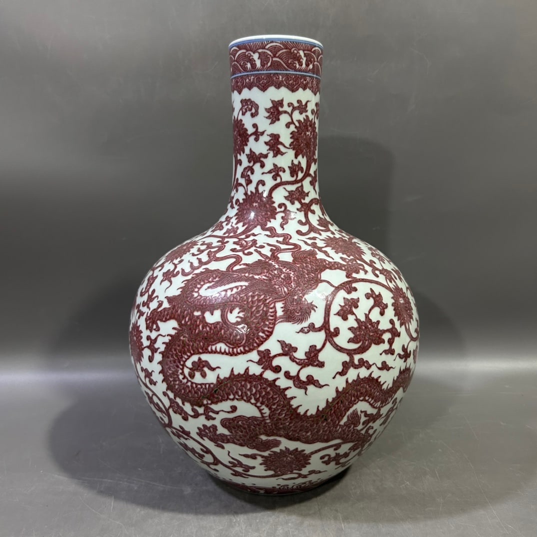 A Exquisite Underglaze-Red Lotus Dragon Pattern Vase: A Exquisite Underglaze-Red Lotus Dragon Pattern Vase,Qing Dynasty, China,Qianlong Six-character Mark,Size:8.3inx15in 
