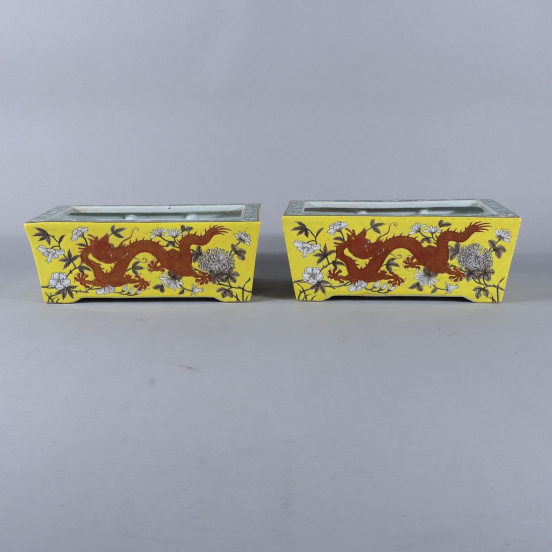 A pair of Exquisite Yellow Ground Ink Color Painted Gold Dragon Pattern Basin: A pair of Exquisite Yellow Ground Ink Color Painted Gold Dragon Pattern Basin,Qing Dynasty, China,Guangxu Six-character Mark,Size:3.7inx9.8inx6.3inx8.7inx5.5in 一对黄地墨