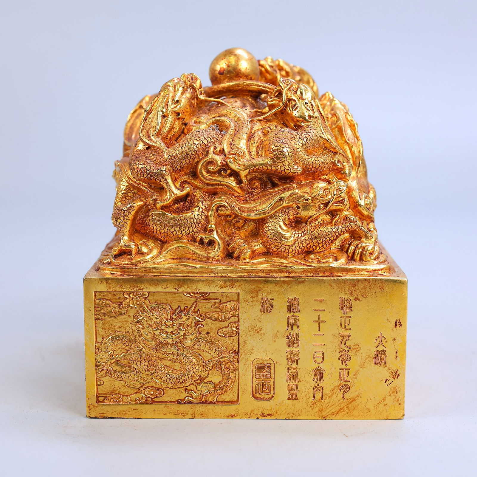 A Exquisite Bronze Gilt Carved Dragon Seal: A Exquisite Bronze Gilt Carved Dragon Seal,Qing Dynasty, China,Size:5.5inx4.3in,Weight:7140g 铜鎏金雕刻龙印章,中国清代